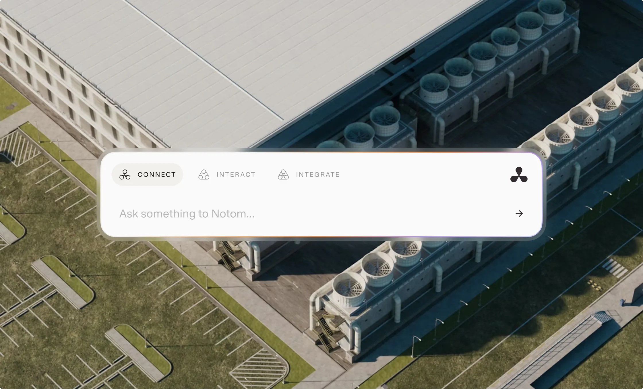 Notom website homepage over an aerial view of an industrial plant